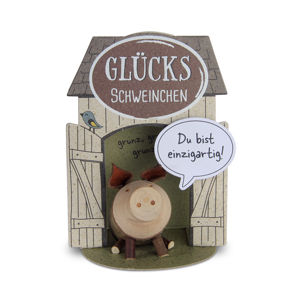 Glücksschweinchen sitzend: "Du bist einzigartig!" Glücksschweinchen sitzend: "Du bist einzigartig!"