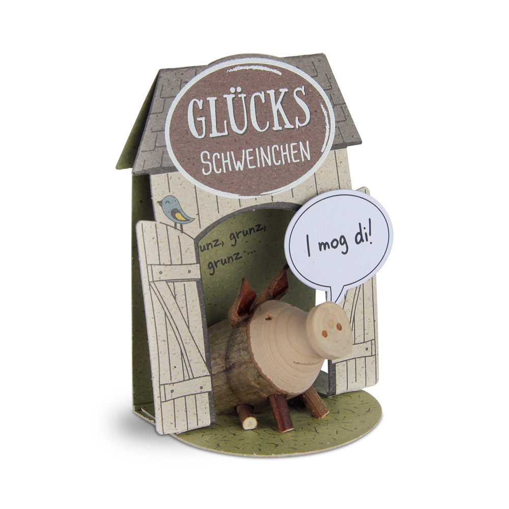 Glücksschweinchen sitzend: "I mog di!" Glücksschweinchen sitzend: "I mog di!"